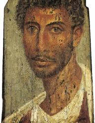 Fayum encaustic funerary portrait of a dark-haired young man with a short beard